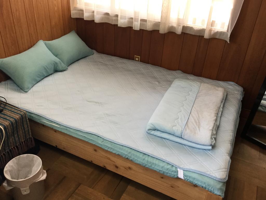 Hostal Yado Ari Itoman Habitación foto