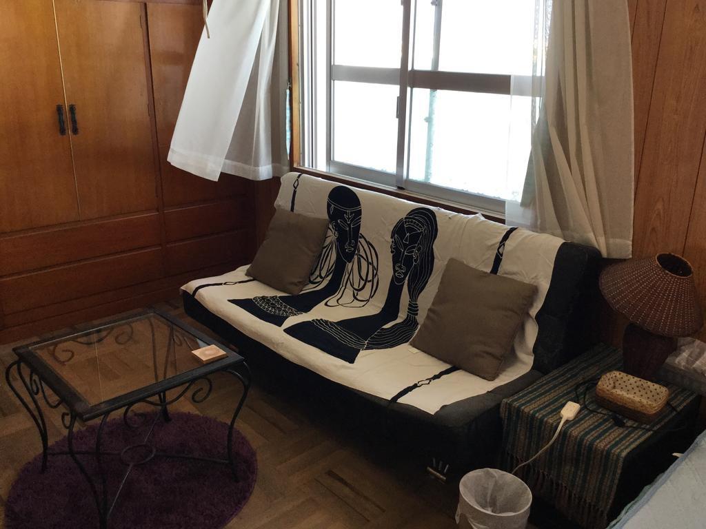 Hostal Yado Ari Itoman Habitación foto