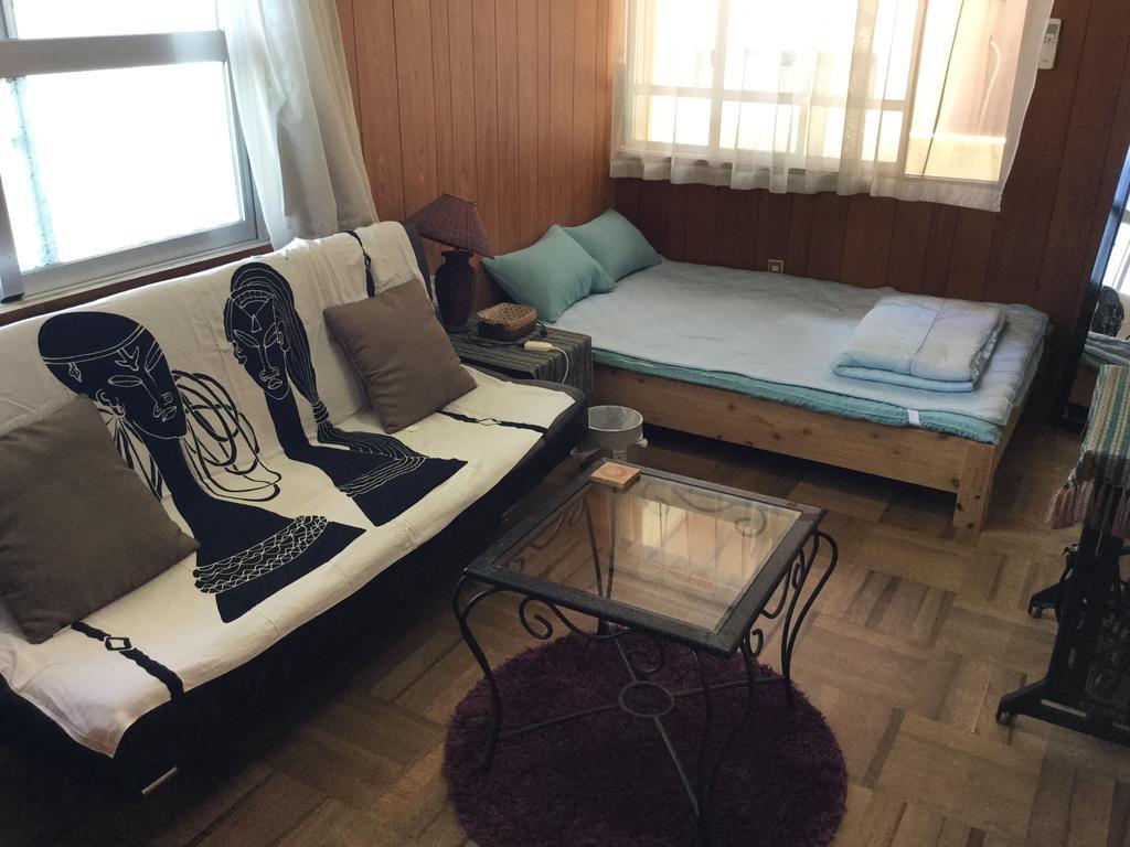 Hostal Yado Ari Itoman Habitación foto